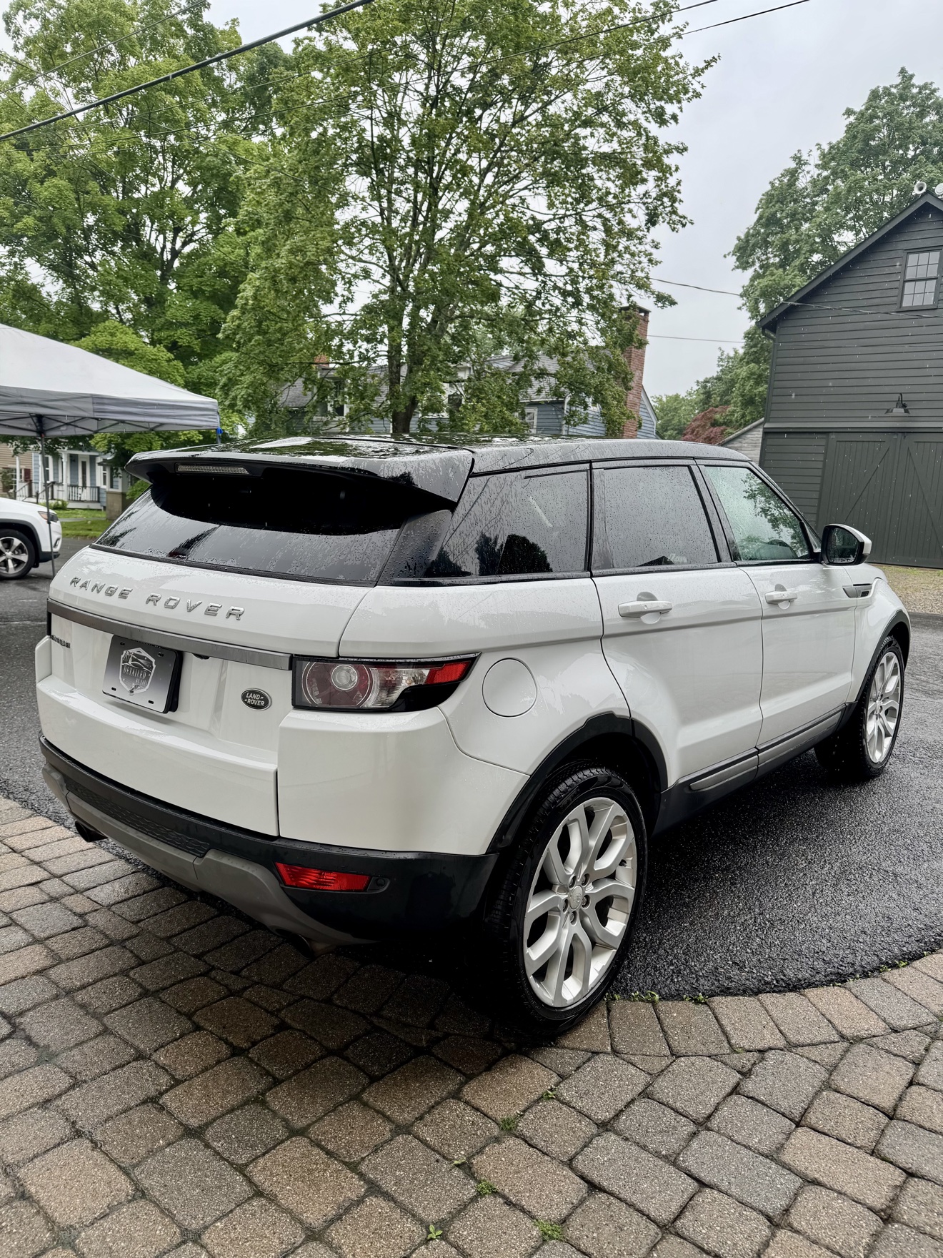 White Range Rover Evoque rear angle view after detailing