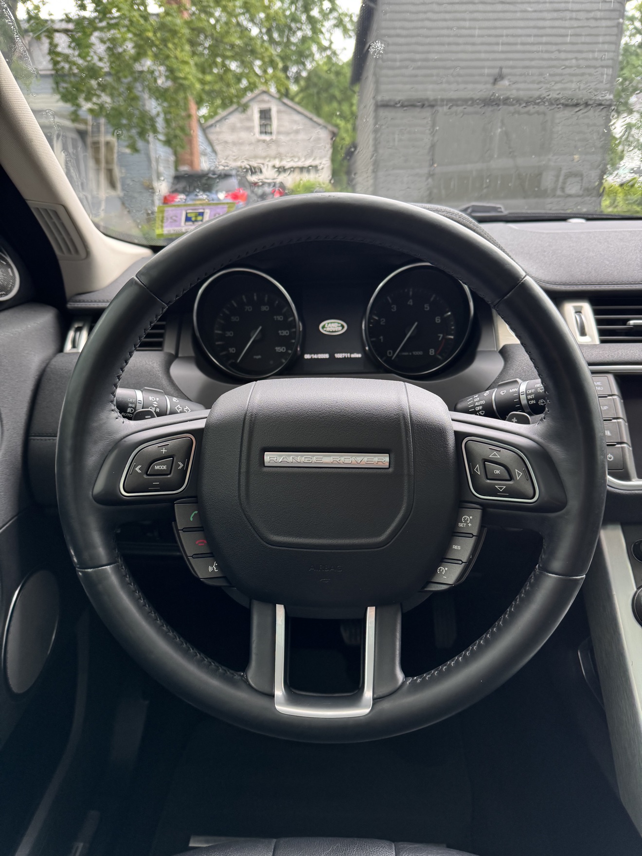 Close-up of the Range Rover steering wheel in an Evoque after detailing