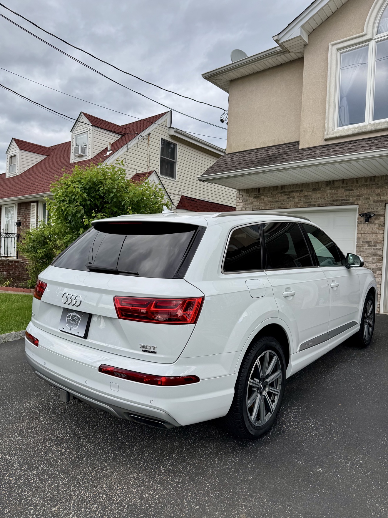 White Audi Q7 rear angle view after detailing