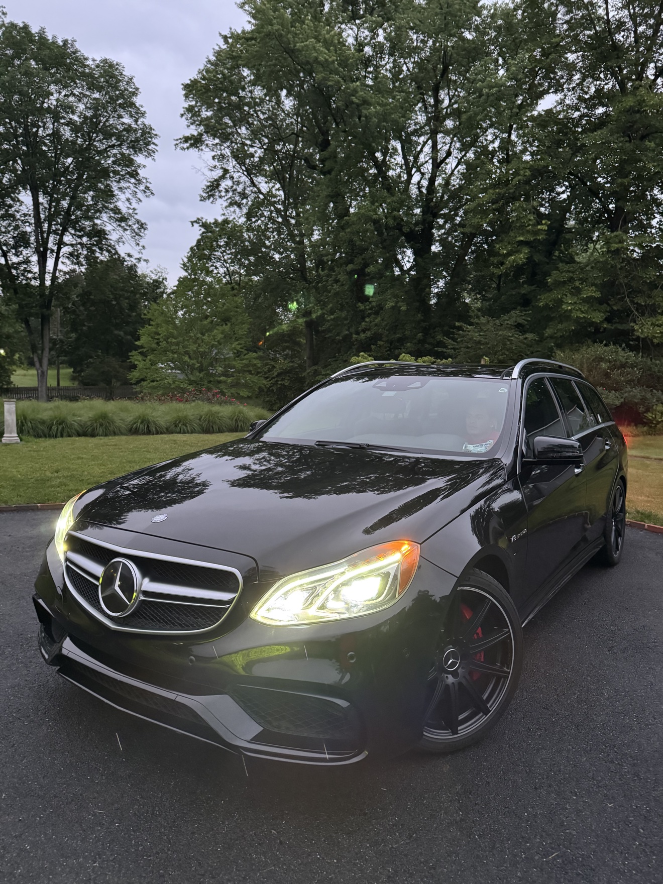 Black Mercedes Benz E63 S AMG wagon after detailing