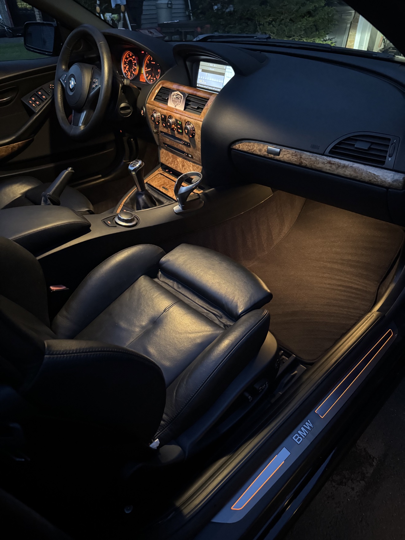 BMW 650i passenger side cockpit with black leather interior