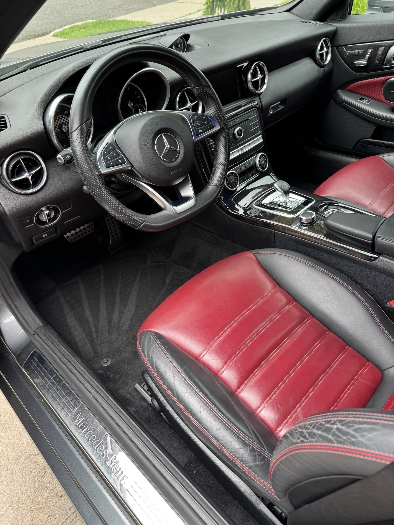 Mercedes-Benz SLC 300 driver cockpit with red and black leather interior
