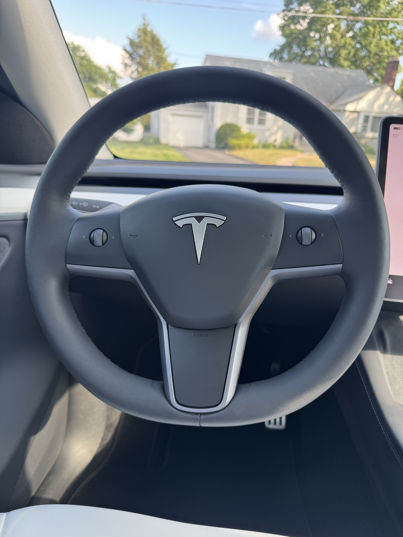 Close-up of the steering wheel in a Tesla Model Y