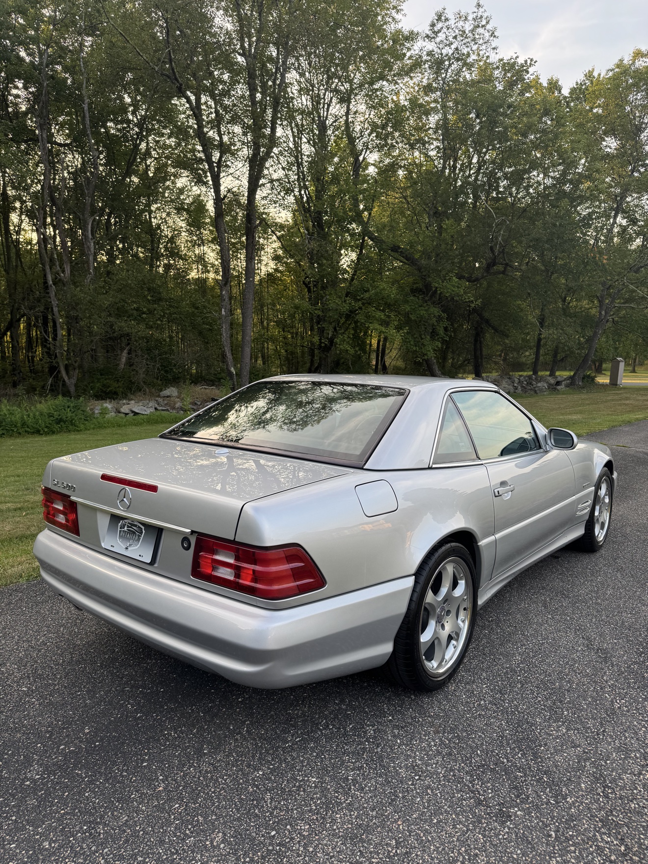 Silver Mercedes-Benz SL500 rear angle view after detailing