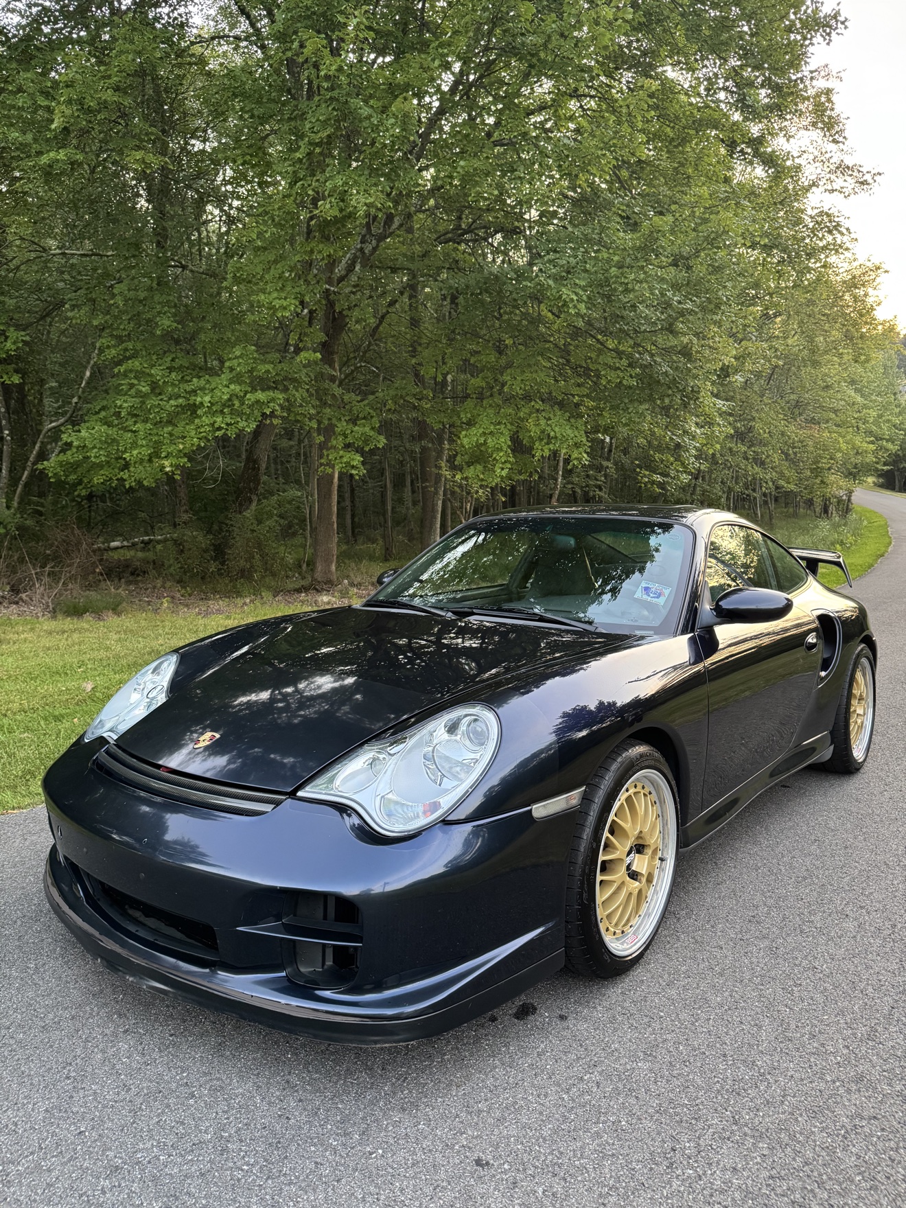 Black Porsche 911 Turbo coupe after detailing