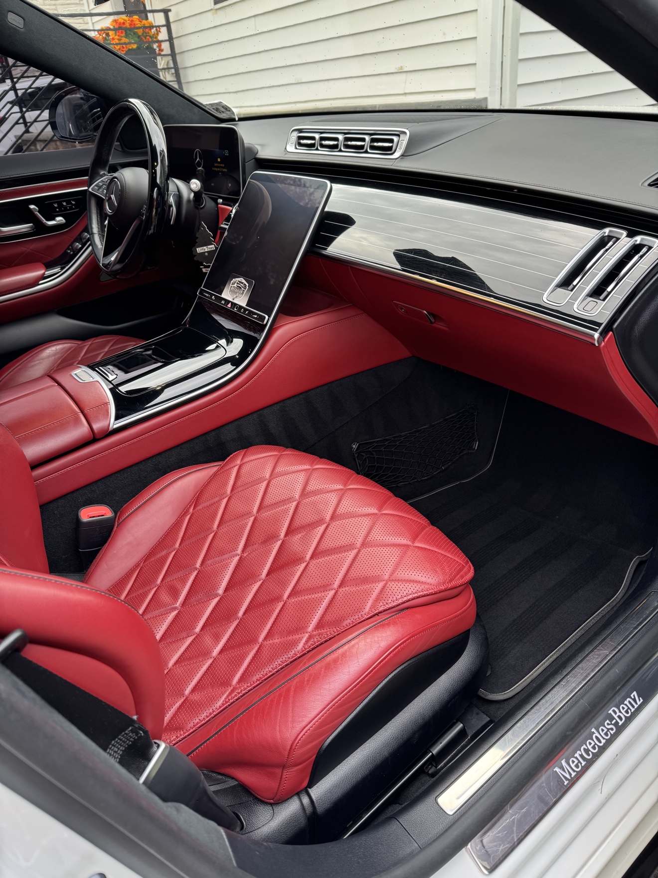 Mercedes-Benz S580 passenger side cockpit with red quilted leather interior