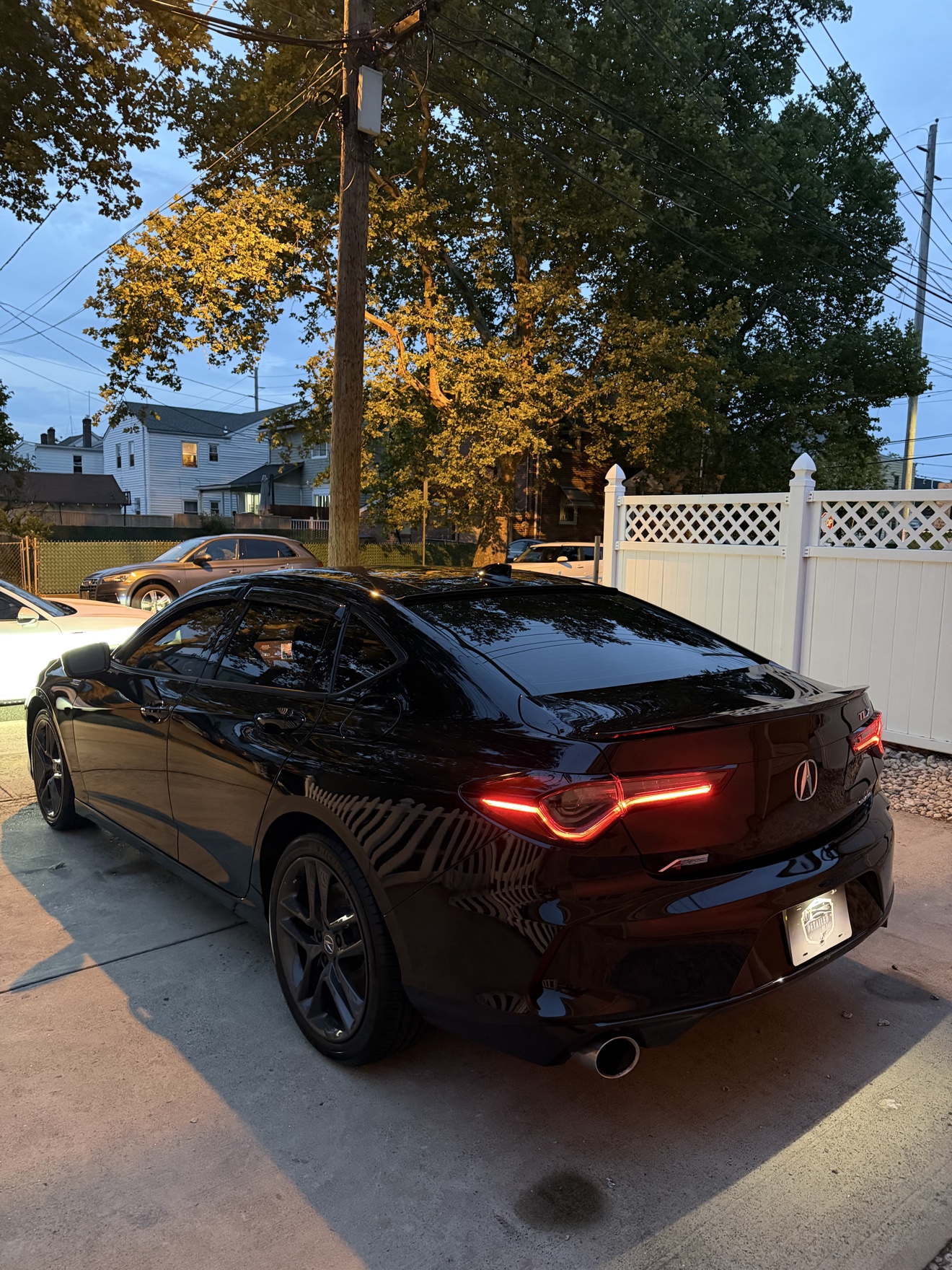 Black Acura TLX SH-AWD A-Spec rear angle view after detailing