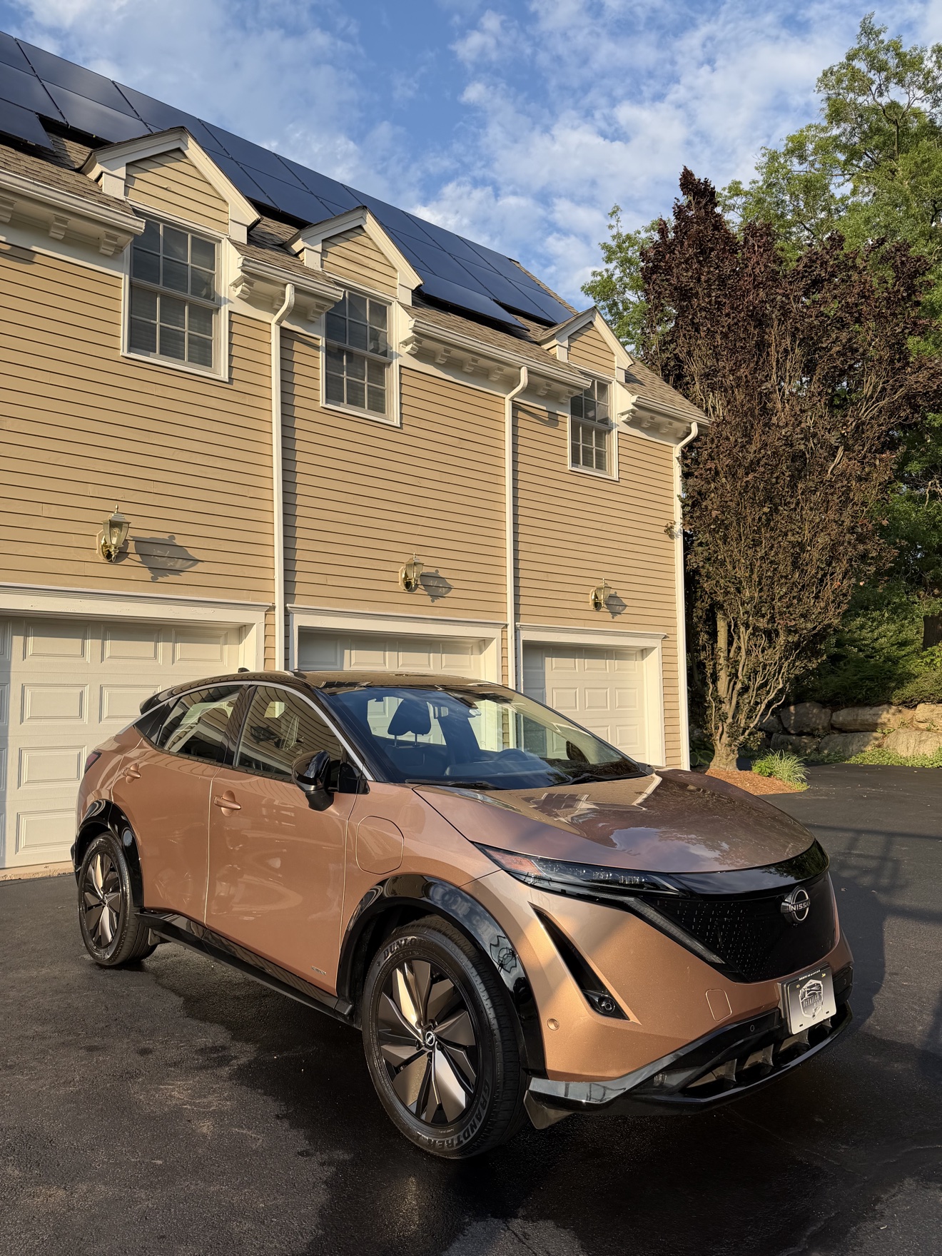 Copper Nissan Ariya electric crossover after detailing