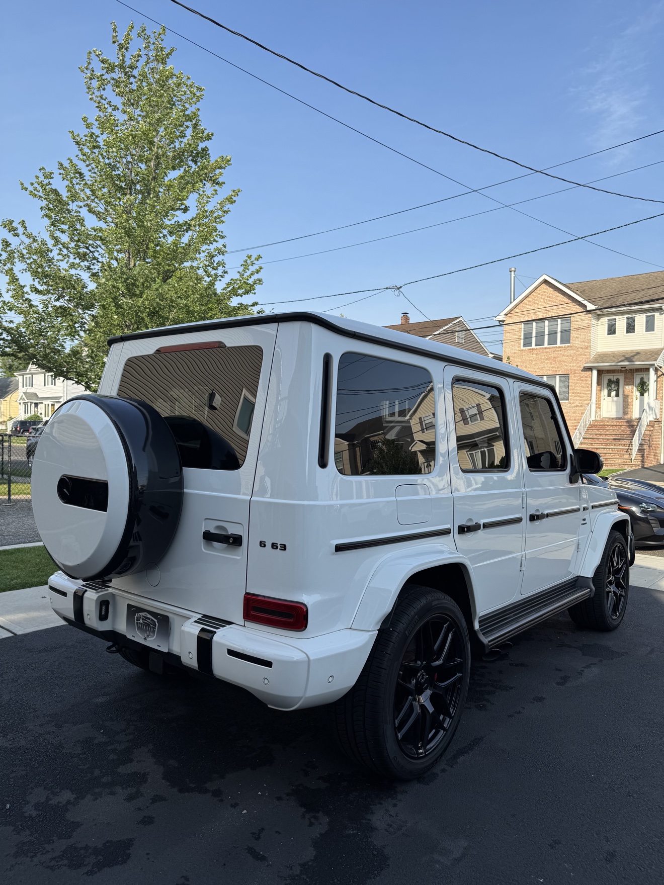 White Mercedes-AMG G 63 rear angle after detailing