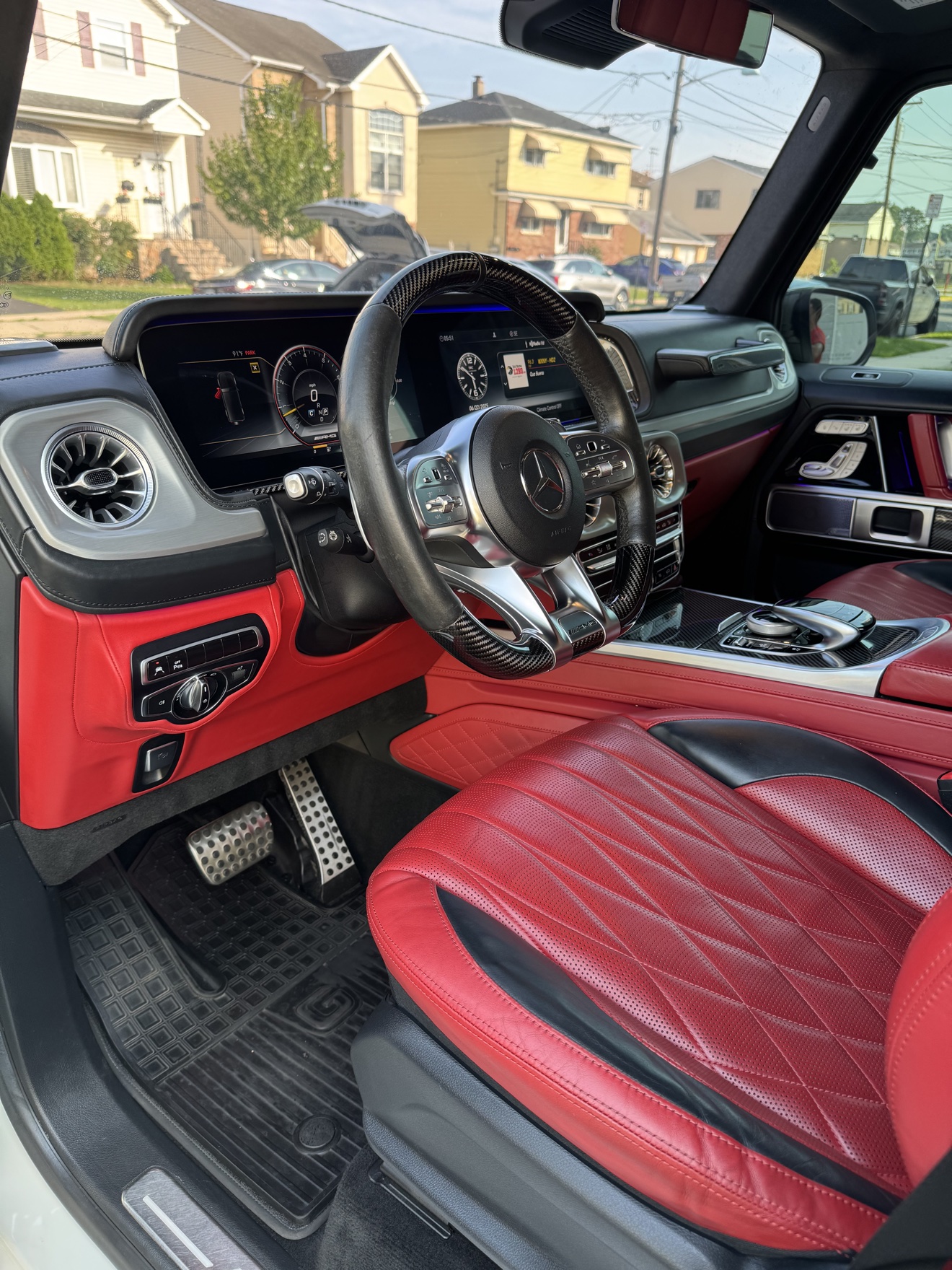 G-Wagon driver cockpit with red leather seats after detailing