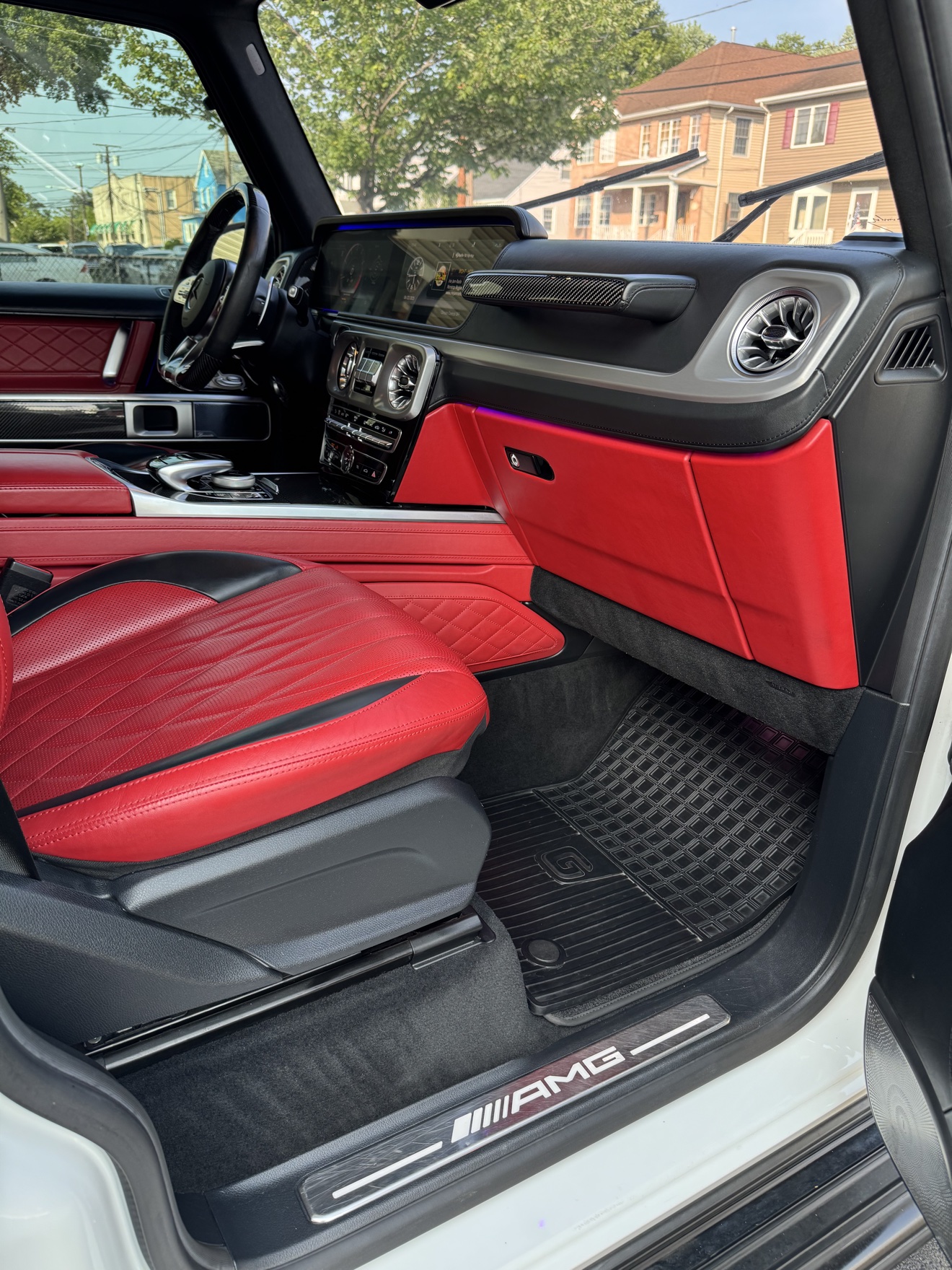 G-Wagon passenger dashboard and red leather seat after detailing
