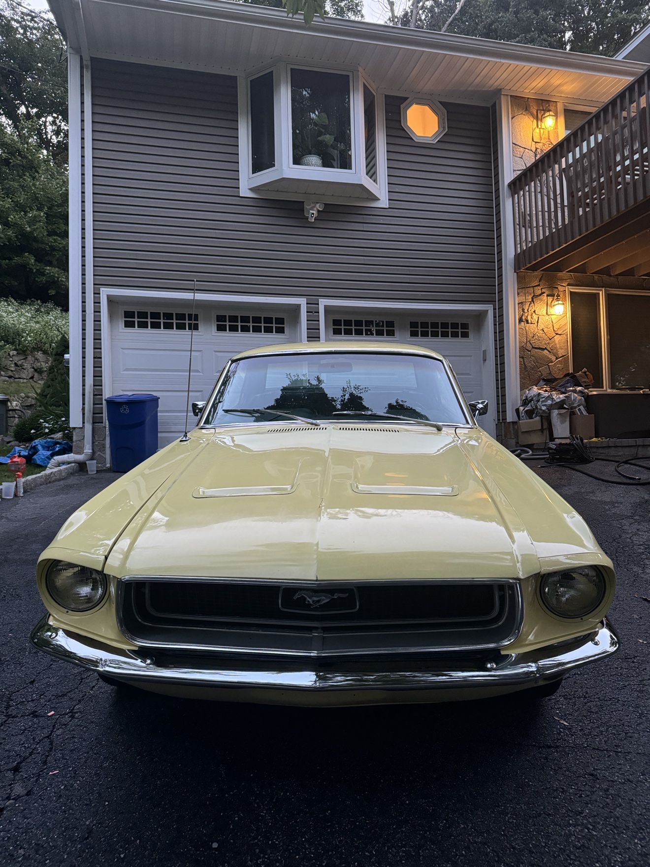 Pale yellow 1968 Ford Mustang front view with chrome bumper